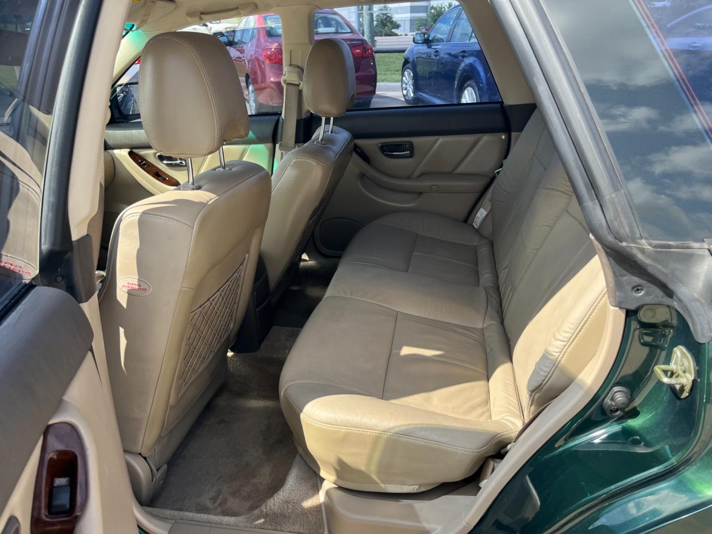 2003 green /TAN Subaru Outback Limited Wagon (4S3BH686737) with an 2.5L H4 SOHC 16V engine, 5-Speed Manual Overdrive transmission, located at 14700 Tomball Parkway 249, Houston, TX, 77086, (281) 444-2200, 29.928619, -95.504074 - Photo#9